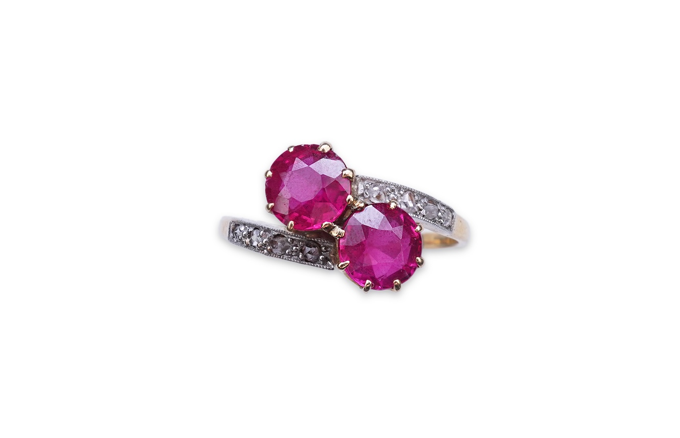 A synthetic ruby and diamond 'toi-et-moi' ring, early 20th century